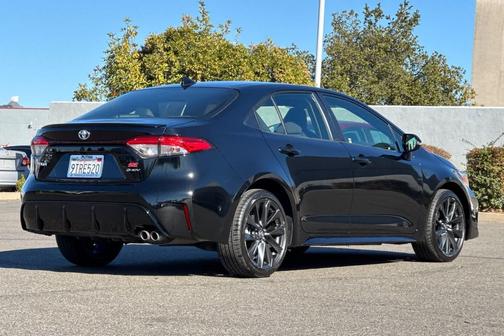 Midnight Black Metallic 2025 Toyota Corolla Hybrid SE