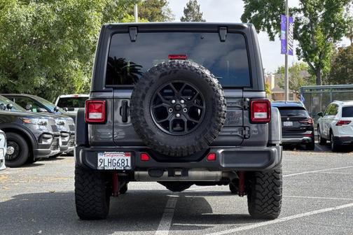 Crystal Metallic 2024 Jeep Wrangler Sport