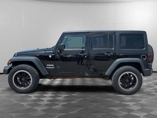 Black 2014 Jeep Wrangler Unlimited Sport