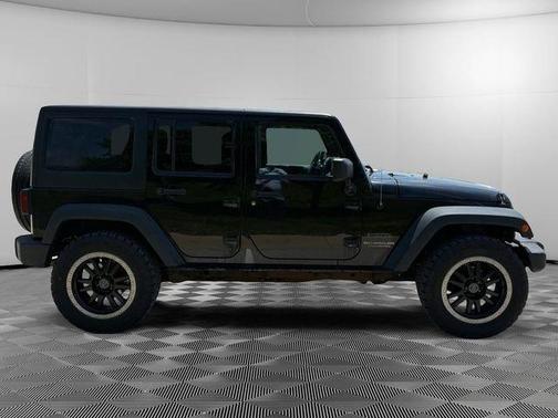 Black 2014 Jeep Wrangler Unlimited Sport