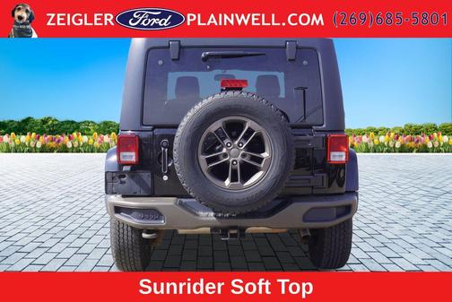 Black Clearcoat 2016 Jeep Wrangler Unlimited Sahara