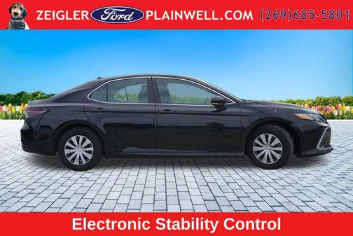 Midnight Black Metallic 2024 Toyota Camry Hybrid LE