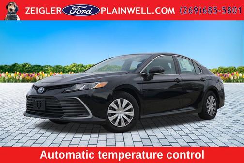 Midnight Black Metallic 2024 Toyota Camry Hybrid LE