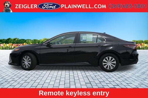 Midnight Black Metallic 2024 Toyota Camry Hybrid LE