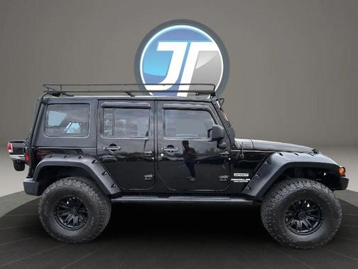 Black Clearcoat/Black Hard Top 2010 Jeep Wrangler Unlimited Sport