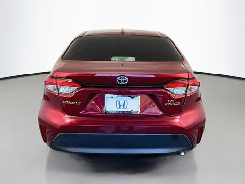 Ruby Flare Pearl 2024 Toyota Corolla Hybrid LE