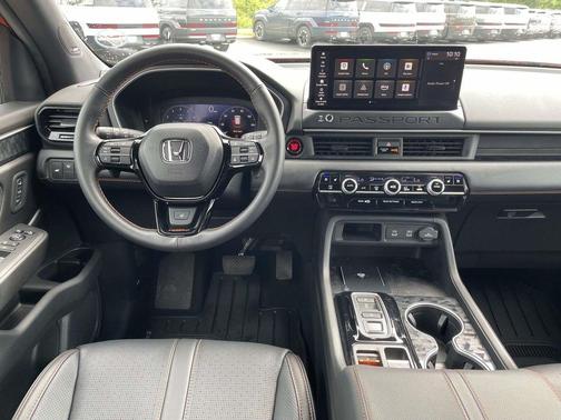 Orange 2026 Honda Passport TrailSport