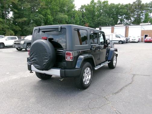 Black 2015 Jeep Wrangler Unlimited Sahara