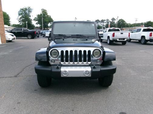 Black 2015 Jeep Wrangler Unlimited Sahara