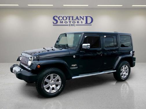 Black 2015 Jeep Wrangler Unlimited Sahara