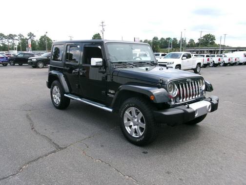 Black 2015 Jeep Wrangler Unlimited Sahara