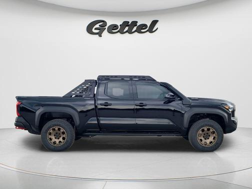 Black 2025 Toyota Tacoma Hybrid Trailhunter