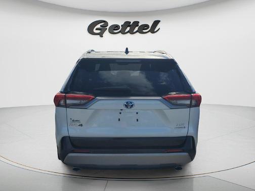 Wind Chill Pearl/Midnight Black Metallic 2024 Toyota RAV4 Hybrid SE