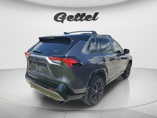 Magnetic Gray Metallic/Midnight Black Metallic 2024 Toyota RAV4 Hybrid SE