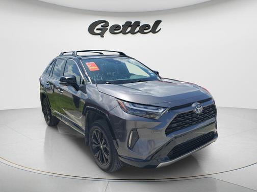 Magnetic Gray Metallic/Midnight Black Metallic 2024 Toyota RAV4 Hybrid SE