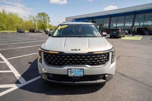 Ivory Silver 2025 Kia Carnival Hybrid SX Prestige