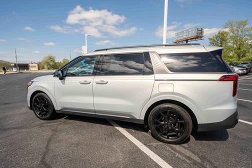 Ivory Silver 2025 Kia Carnival Hybrid SX Prestige