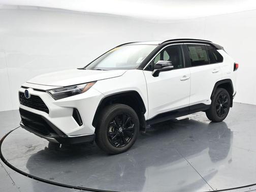Wind Chill Pearl/Midnight Black Metallic 2023 Toyota RAV4 Hybrid SE