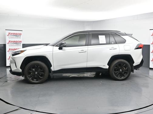 Wind Chill Pearl/Midnight Black Metallic 2024 Toyota RAV4 Hybrid SE
