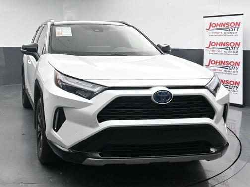 Wind Chill Pearl/Midnight Black Metallic 2024 Toyota RAV4 Hybrid SE