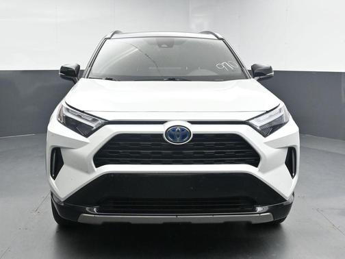 Wind Chill Pearl/Midnight Black Metallic 2024 Toyota RAV4 Hybrid SE