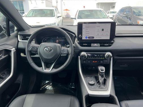 Wind Chill Pearl/Midnight Black Metallic 2024 Toyota RAV4 Hybrid SE