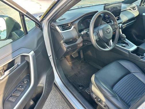 Silver Sky Metallic/Midnight Black Metallic 2024 Toyota RAV4 Hybrid SE