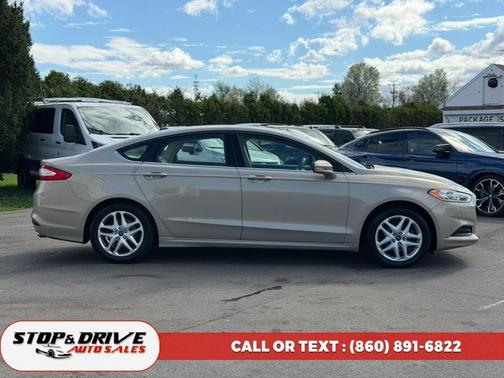 gold 2015 Ford Fusion SE