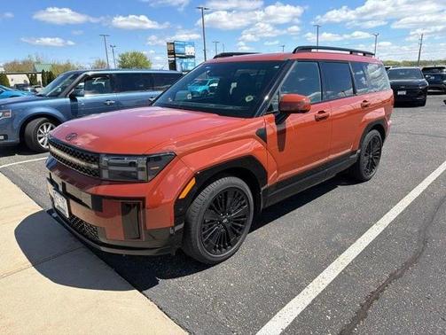 Orange 2025 Hyundai SANTA FE HEV Calligraphy