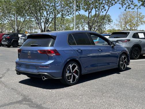 slate blue metallic 2026 Volkswagen Golf GTI 2.0T SE DSG