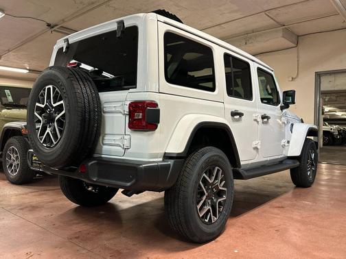 White 2027 Jeep Wrangler Sahara