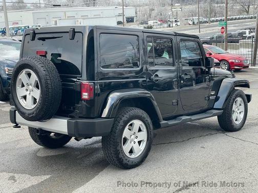 Black 2012 Jeep Wrangler Unlimited Sahara