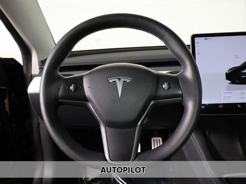 Solid Black 2023 Tesla Model 3 Performance