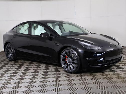 Solid Black 2023 Tesla Model 3 Performance