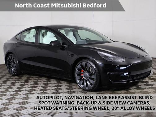 Solid Black 2023 Tesla Model 3 Performance