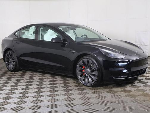 Solid Black 2023 Tesla Model 3 Performance