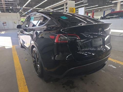 Solid Black 2023 Tesla Model Y Performance Dual Motor All-Wheel Drive