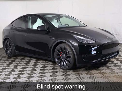 Solid Black 2024 Tesla Model Y Performance Dual Motor All-Wheel Drive