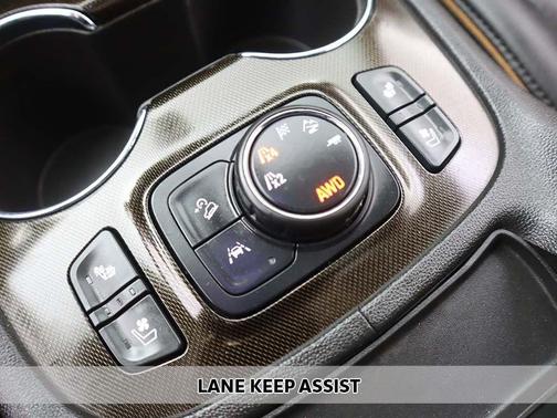 Volcanic Red Tintcoat 2023 GMC Acadia AWD AT4