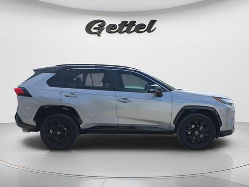 Silver Sky Metallic/Midnight Black Metallic 2023 Toyota RAV4 Hybrid SE