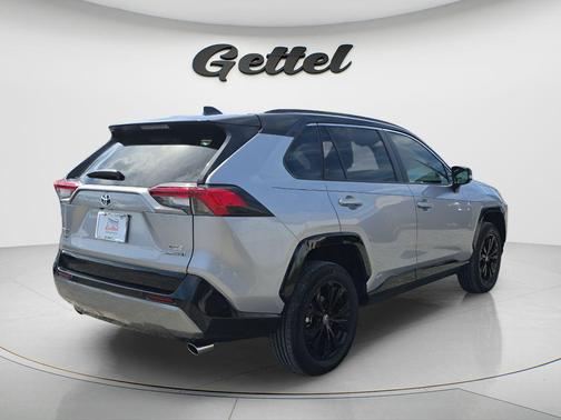Silver Sky Metallic/Midnight Black Metallic 2023 Toyota RAV4 Hybrid SE