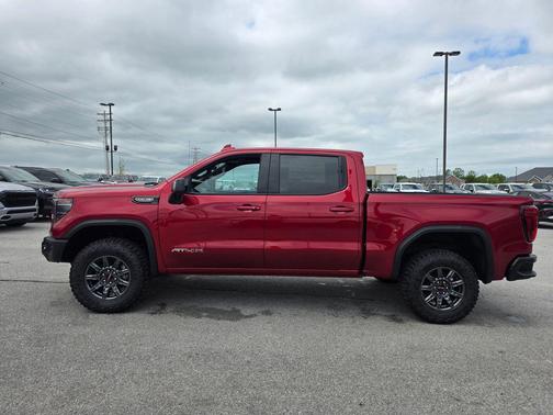 Volcanic Red 2026 GMC Sierra 1500 AT4X