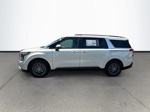 Ivory Silver 2026 Kia Carnival Hybrid EX