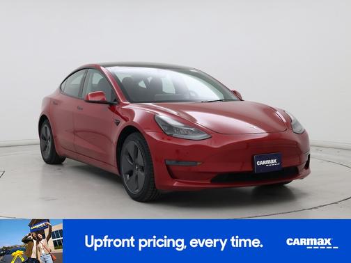 Red 2023 Tesla Model 3