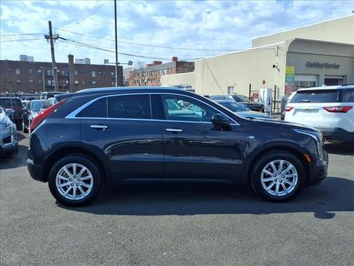 Galactic Gray Metallic 2023 Cadillac XT4 Luxury