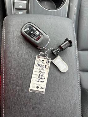 Solar Silver Metallic 2026 Honda Civic Hybrid Sport Touring