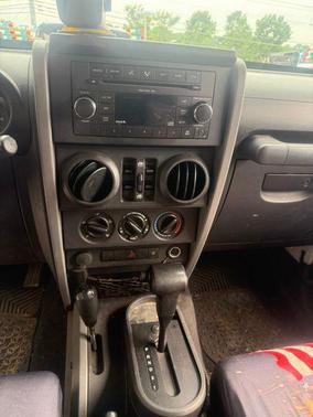 Stone White Clearcoat 2009 Jeep Wrangler Unlimited X