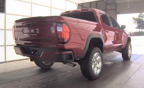 Volcanic Red Tintcoat 2025 GMC Canyon AT4
