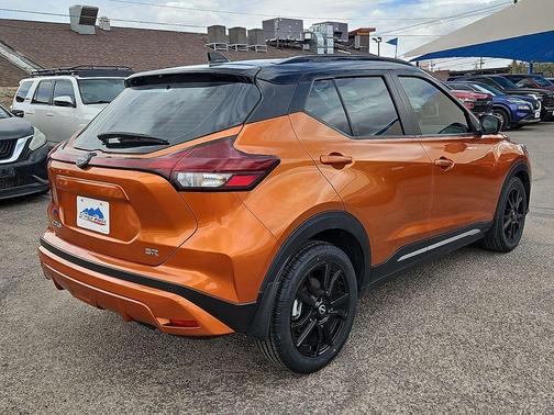 Monarch Orange / Super Black 2023 Nissan Kicks SR