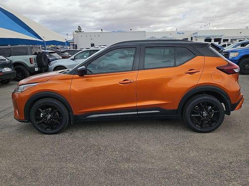 Monarch Orange / Super Black 2023 Nissan Kicks SR